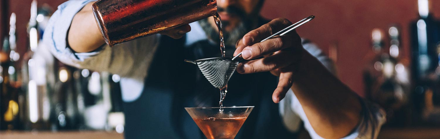 Barman Pouring Drinks
